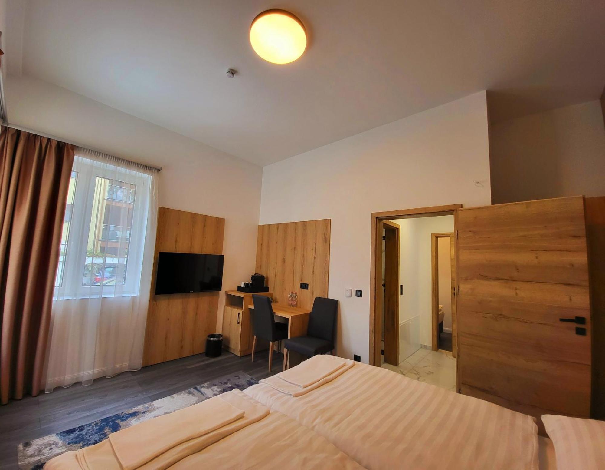 Villa Bauhaus Wellness Apart-Hotel Siófok Pokoj fotografie